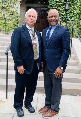 Renslow Shere with US AIDS Ambassador John Nkengasong